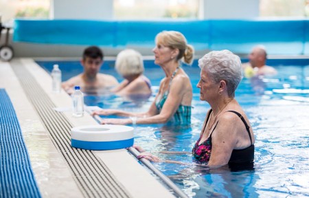 Elderly patients work out in the pool