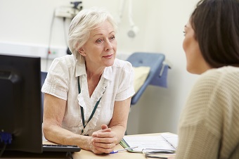 Young woman in GP office